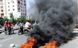 کراچی کے مختلف علاقوں میں فائرنگ اور جلاؤ گھیراؤ
