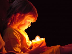 child and candle