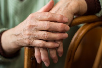 Woman Sitting - rheumatoid arthritis