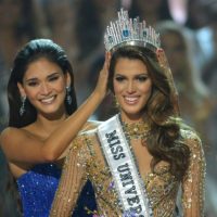 Miss Universe contestant Iris Mittenaere (R) of France is crowned the new 2017 winner