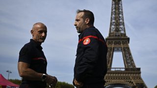French Firefighters Pitch Camp at Eiffel Tower to Demand Better Pay and Conditions